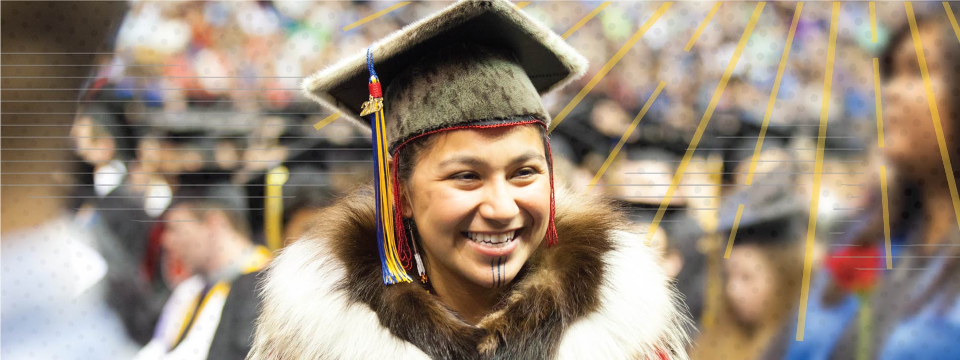 Alaska Native graduate in traditional clothes