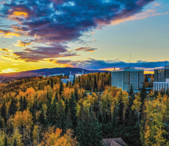 aerial view of the Gruening building on the UAF campus with fall foliage