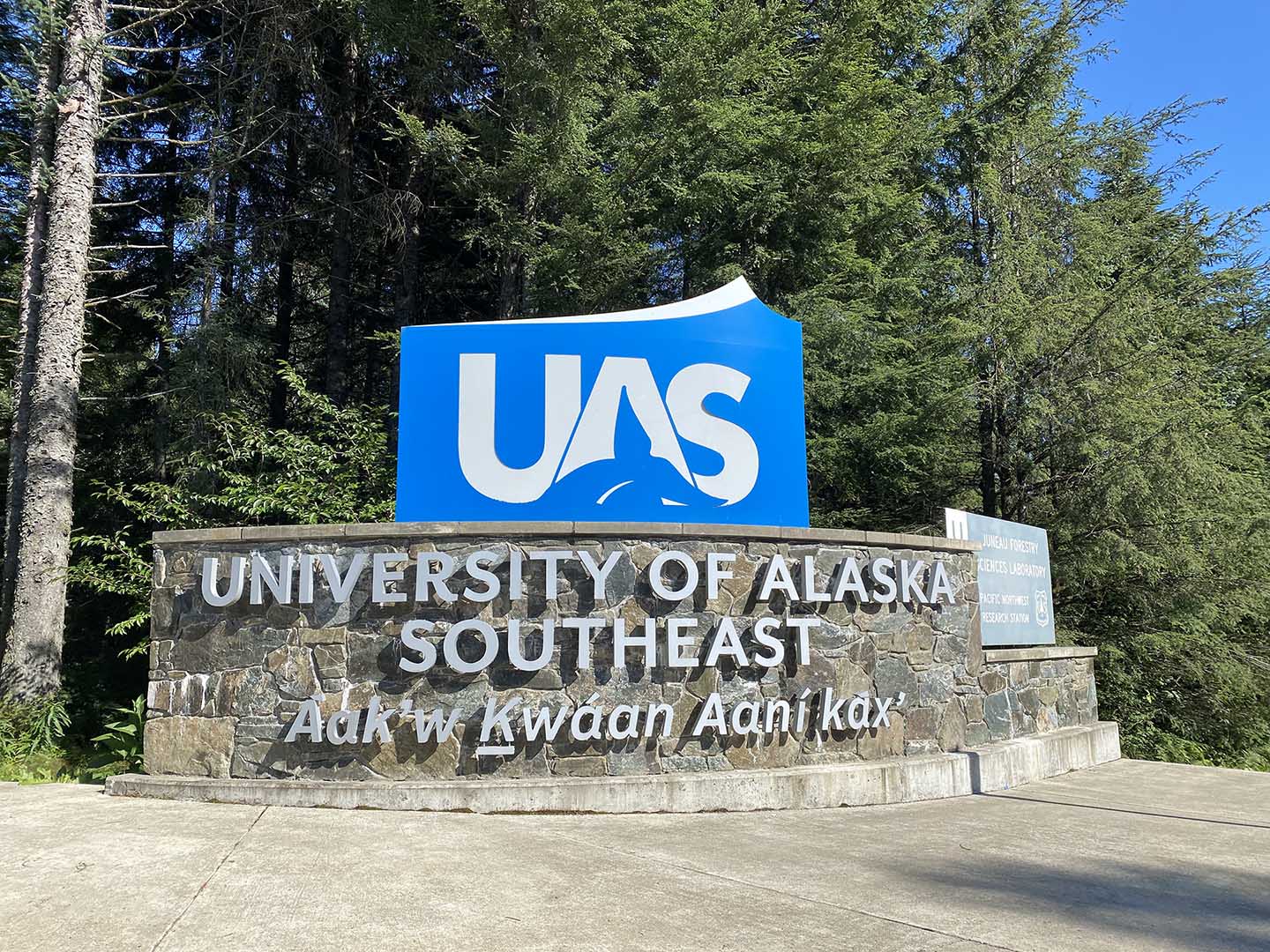 University of Alaska Southeast sign on campus on a sunny day