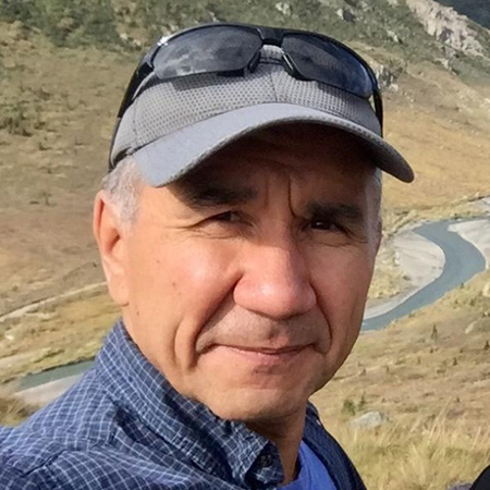 Outdoor Eduard Zdor portrait with river valley in background