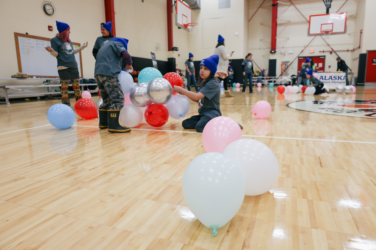 Klukwan students build a tower out of balloons.