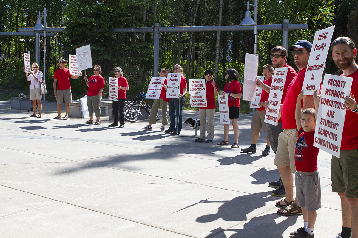 UNAC supporters gather outside the BOR meeting in Anchorage