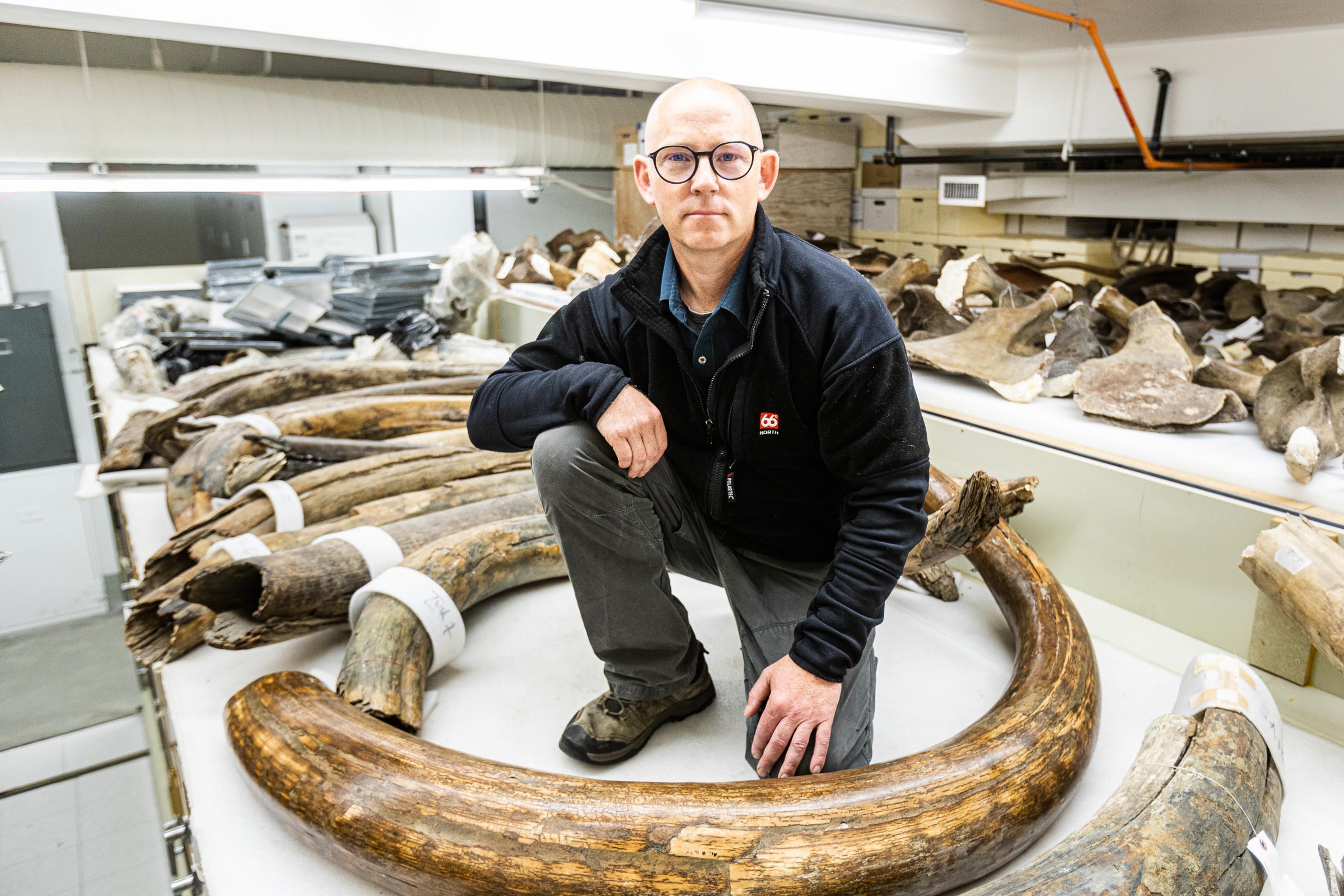 Matt Wooler with mammoth tusks