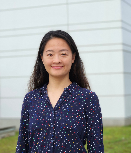 portrait of Xan Yiong in blue shirt