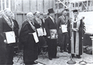 Geophysical Institute's cornerstone ceremony, July 1, 1949. From left, Frank Mapleton, Charles Bunnell, C.J. Woofter, Lou Joy, James Jorgensen, Les Nerland and Seaton.