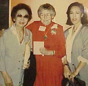 Flora is pictured with Lola Tilly and Jan Petri Haines (Flora's daughter) at the 1979 dedication of the Lola Tilly Commons. Photo: Interior Aleutians Campus, Harper Building