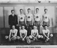 Standing from left to right: Abel (coach), Reed, T. Loftus, A. Loftus, G. Lingo. Sitting: R. Boyd, R. Anderson, D. MacDonald and J. Boswell. Photo: UAF Rasmuson Library